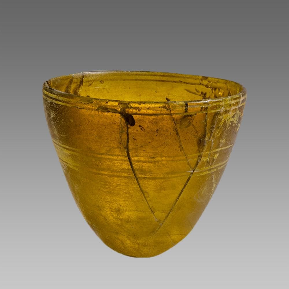 Ancient Hellenistic, conical amber glass bowl c.3rd century BC.