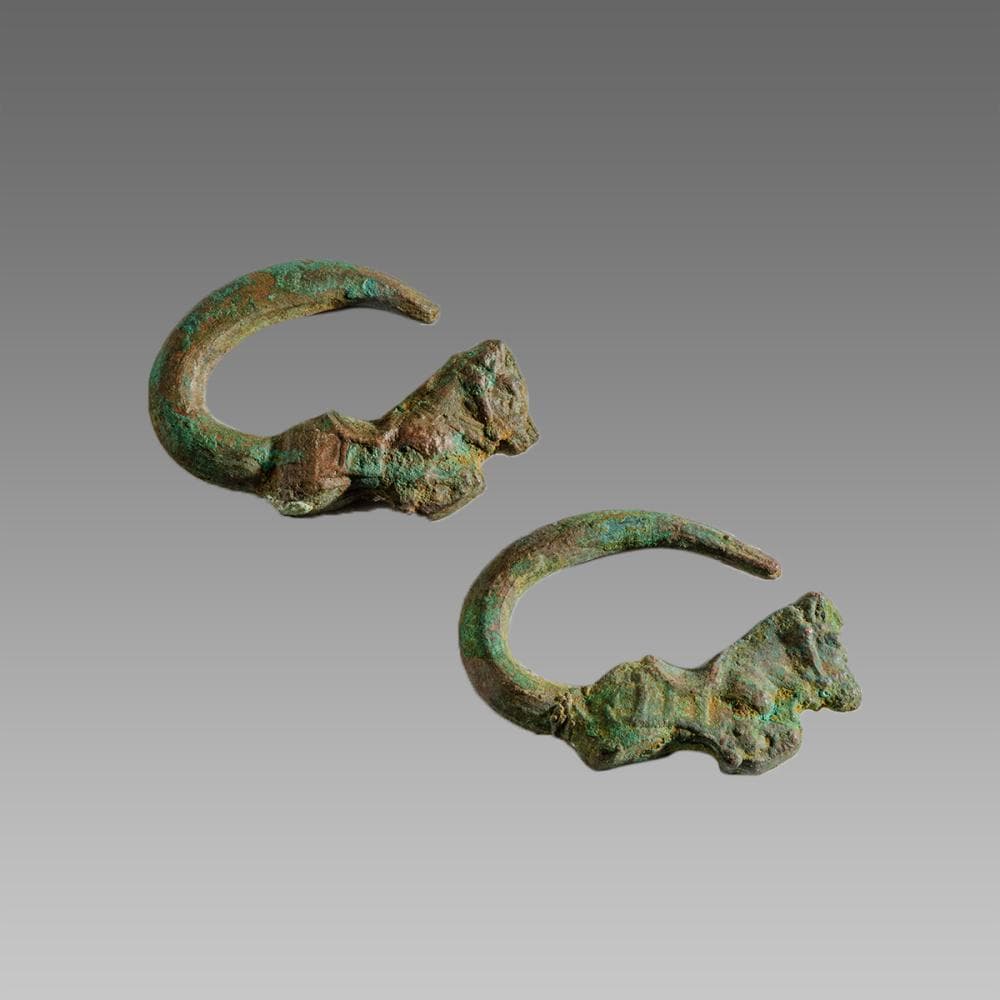 A Pair of Near Eastern Hollow Bronze Earrings.