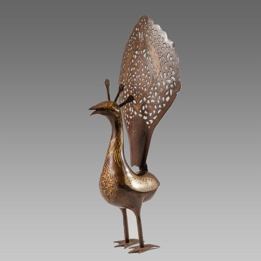 Persian Qajar Style Steel peacock with Gold inlaid.