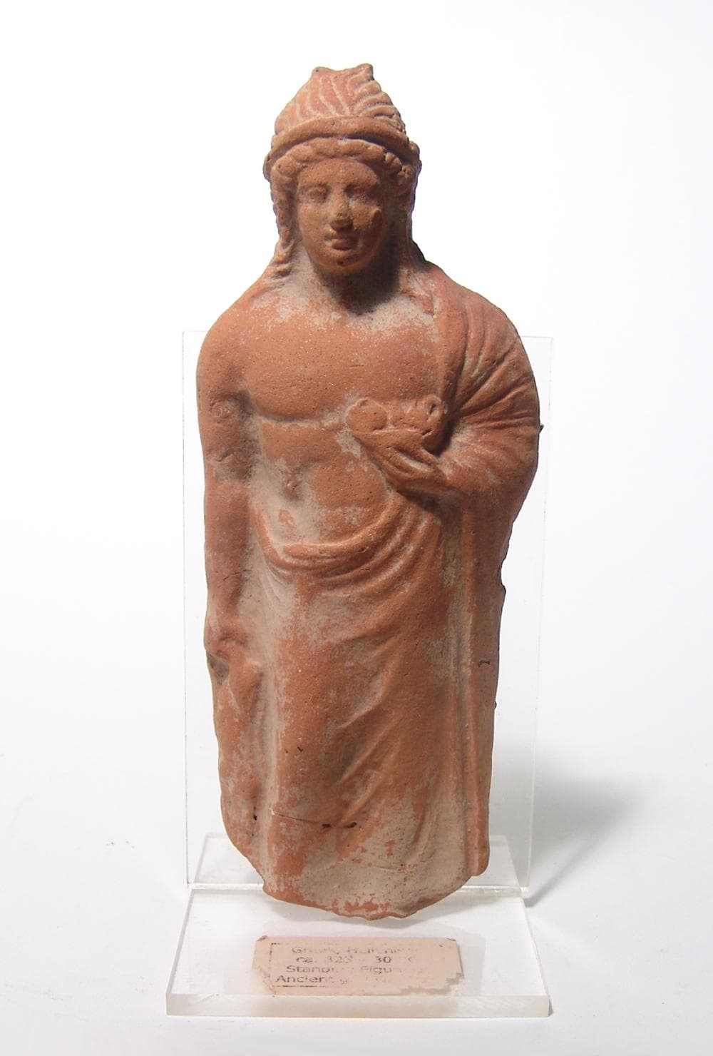 A nice Hellenistic terracotta figure of a youth