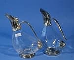 2 glass and silver-plated decanters, h. 25 cm.