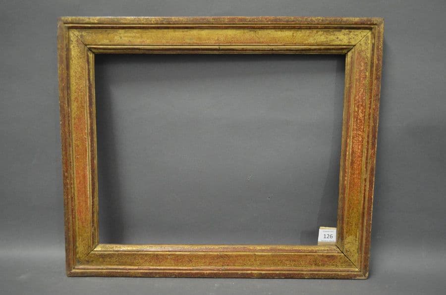 CADRE en chêne mouluré et doré, estampillé…