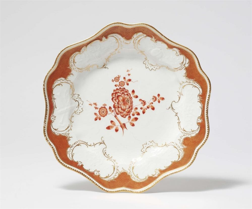 A Meissen porcelain dinner plate from the dinner service with the iron red mosaic border