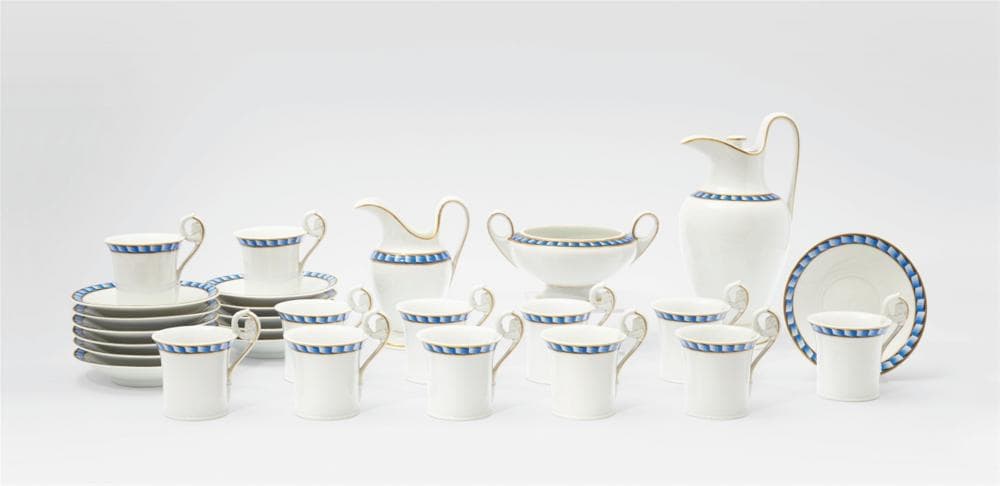 A Berlin KPM porcelain coffee service with blue ribbon borders