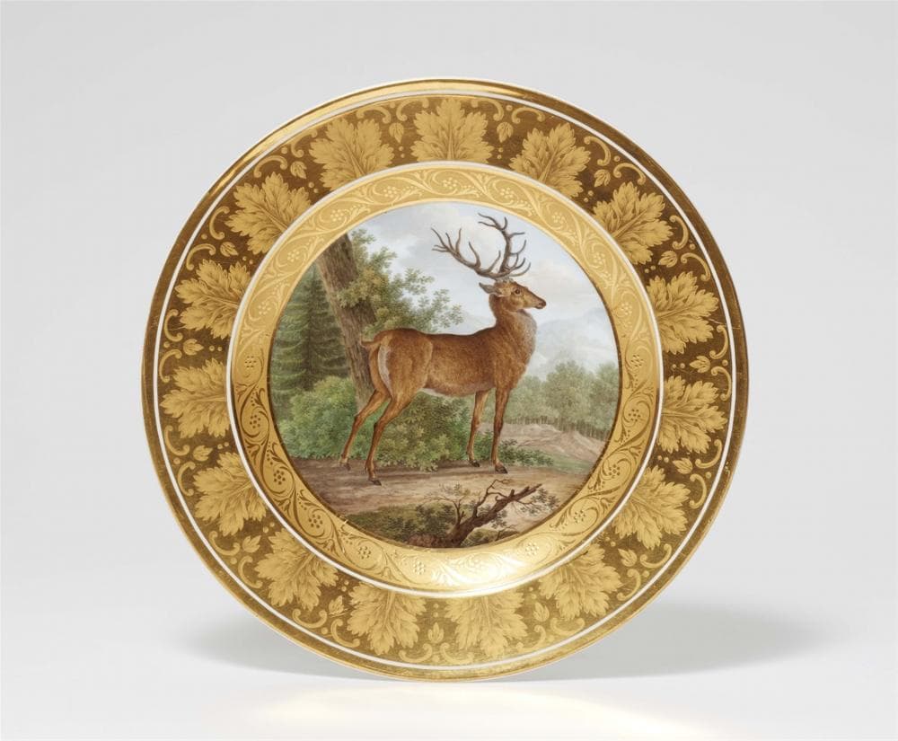 A Berlin KPM porcelain dessert plate with a stag from a service for a general