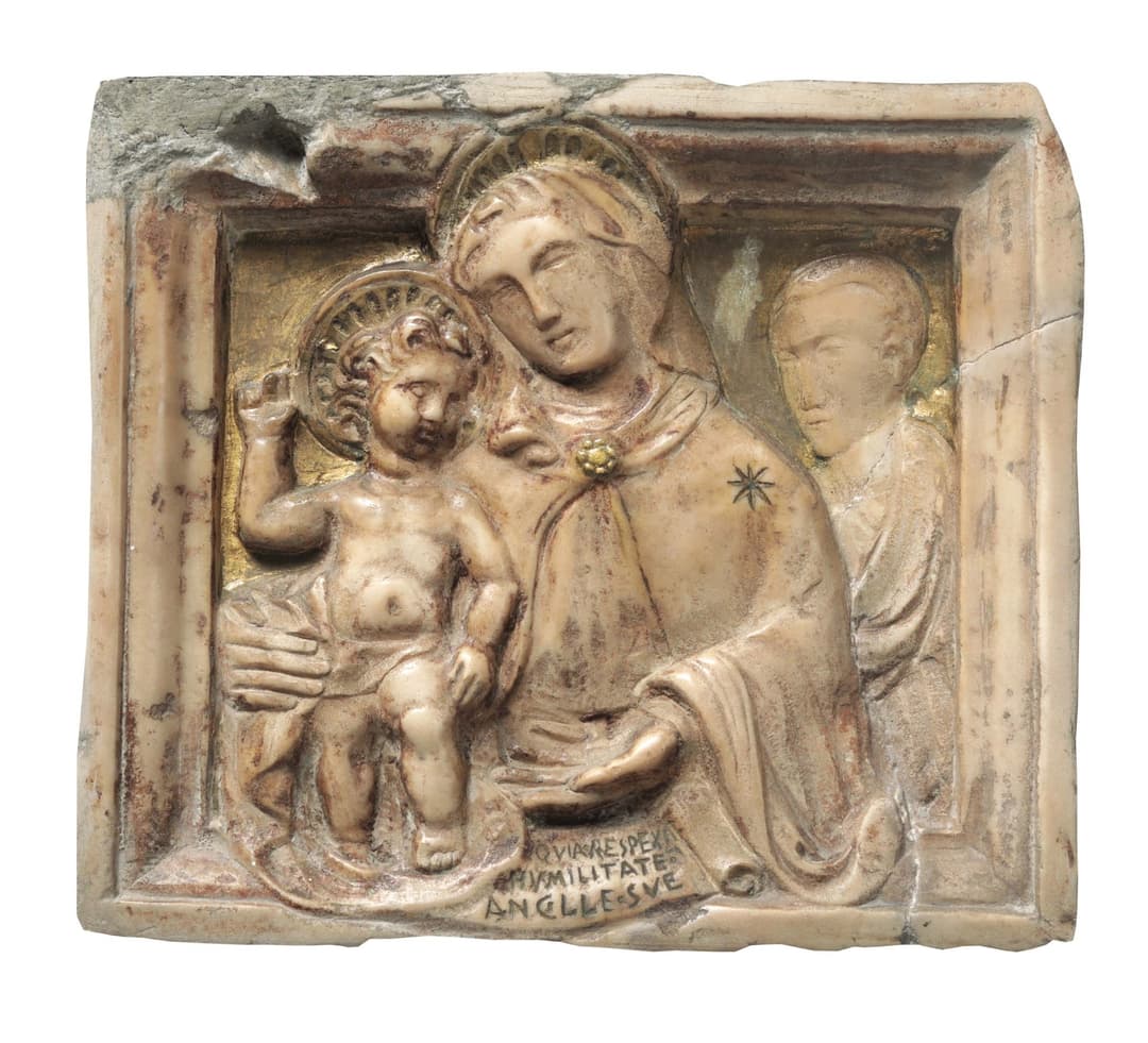 A marble bas-relief with traces of gilding