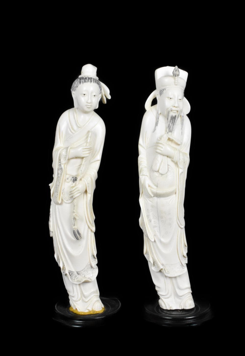 Two Chinese Immortal Carved Figures, each mounted to wood stands, each 12" h.