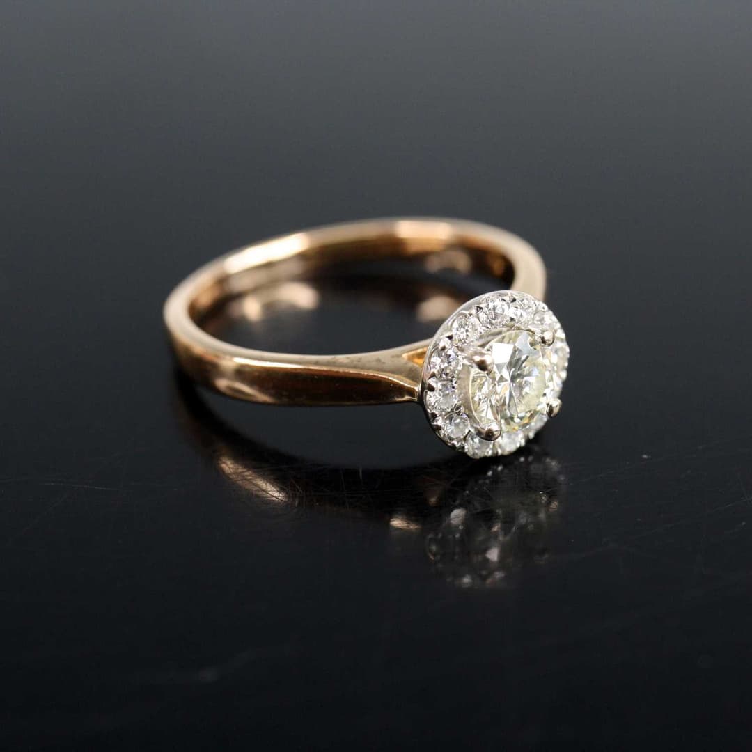 Lot 2002 - A rose and white metal diamond circular