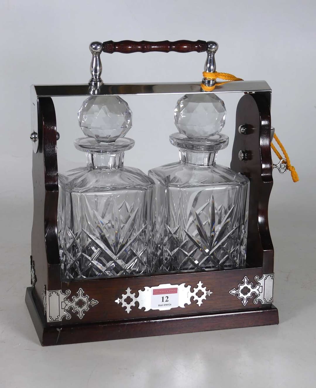 Lot 12 - A reproduction mahogany and silver plated two-