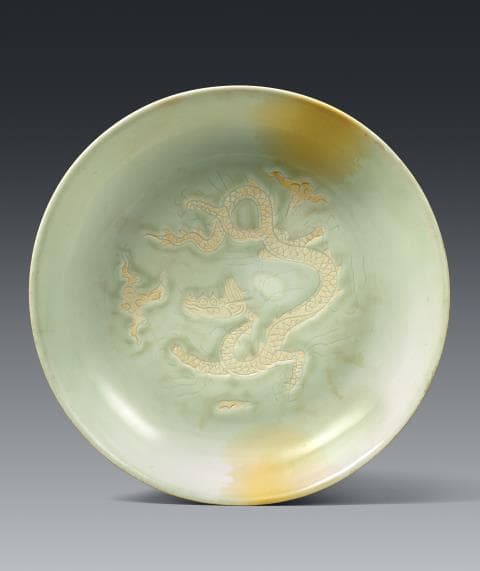 An imperial dragon dish. Zhengde mark and of the period (1506-1521)