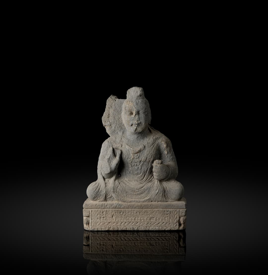 A GRAY SCHIST SEATED BUDDHA
