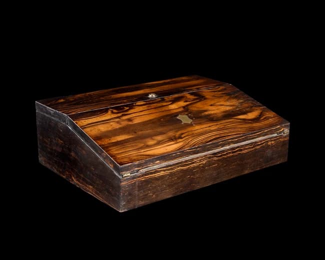 A Coromandel veneered brass inlaid writing slope