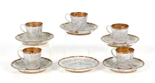 An Assembled Set of Japanese Demitasse Cups and Saucers