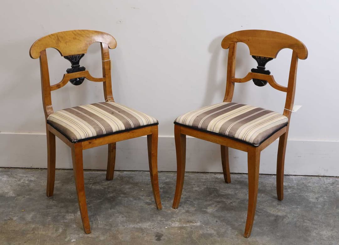 A pair of Biedermeier maple and ebonised side chairs 19th century
