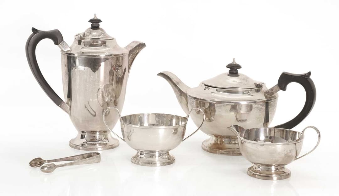A silver four piece tea service