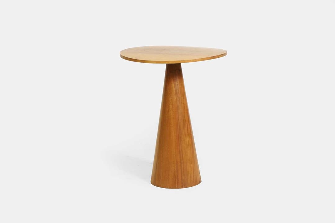 A walnut side table by Rose Uniacke of recent manufacture