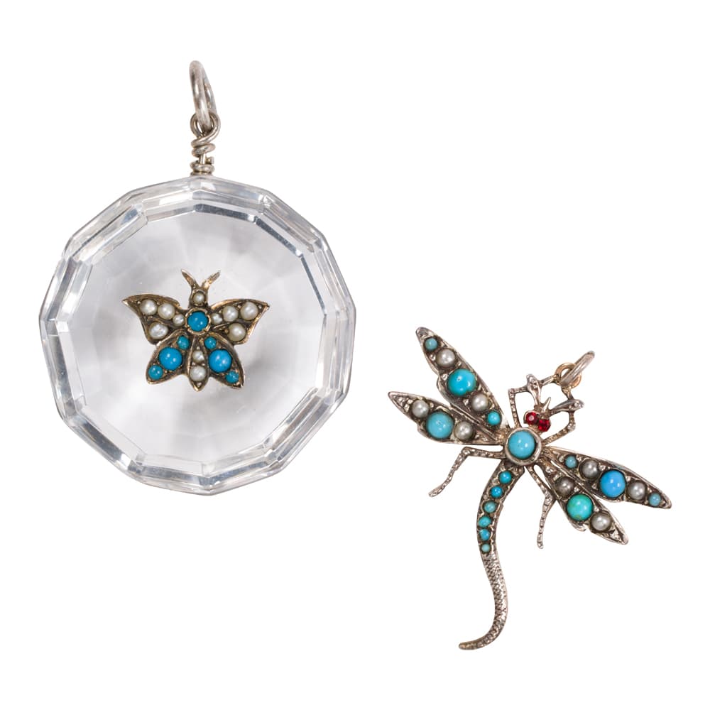 Two turquoise, seed pearl, and silver insect pendants
