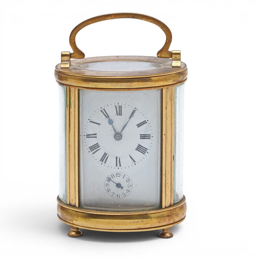 Brass travel clock, late 19th Century.