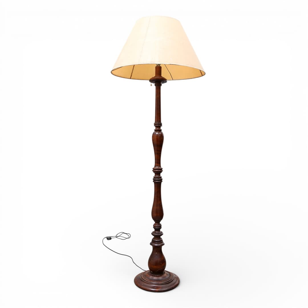 Floor lamp with turned wood stem.