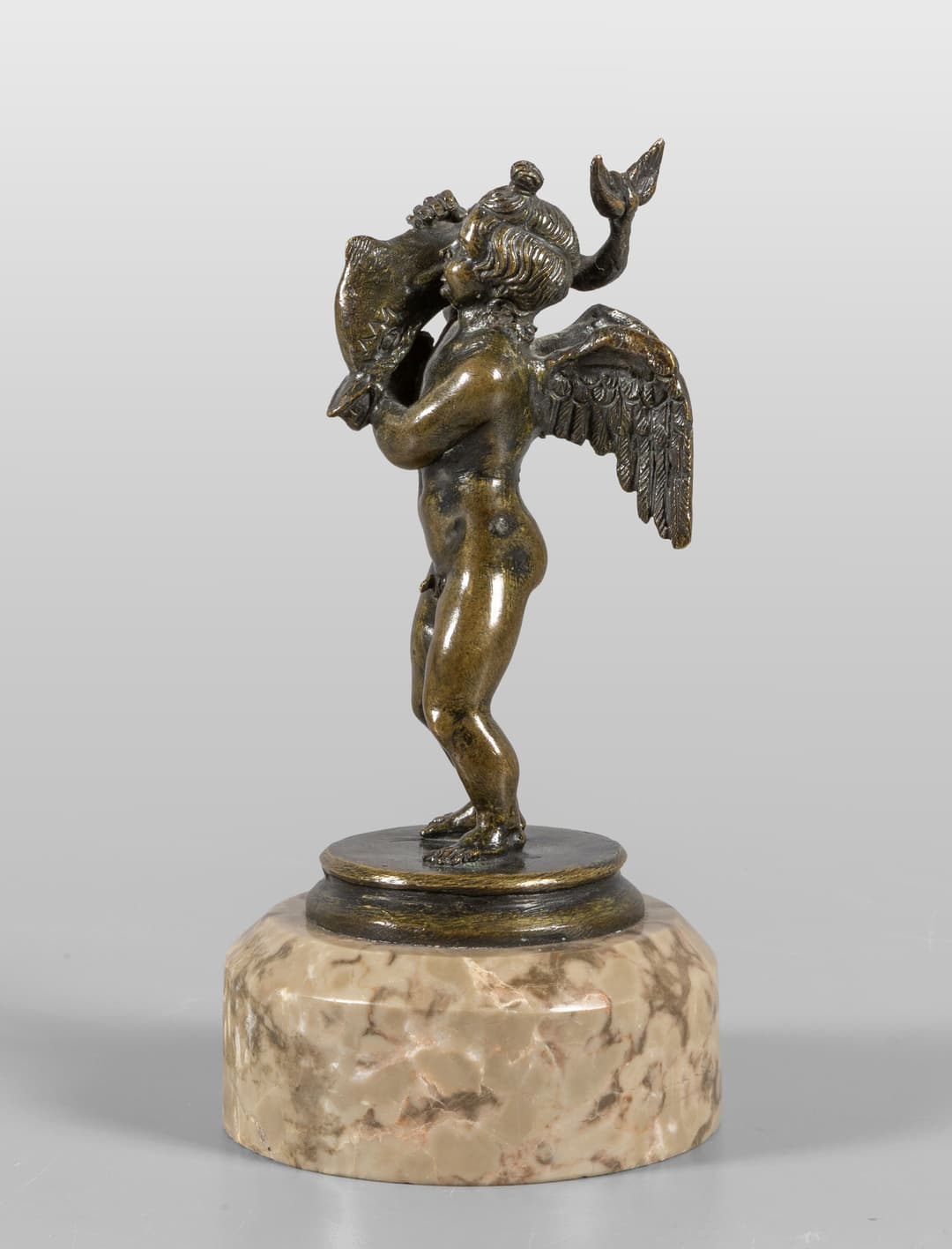 Putto con delfino, scultura in bronzo a patina scura su base in marmo