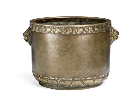 A Chinese patinated bronze censer. Marked Xuande, 18th century. Weight