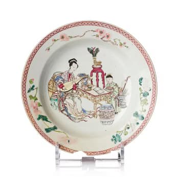 A famille rose ruby-back 'mother and child' plate, Qing dynasty, Yongzheng