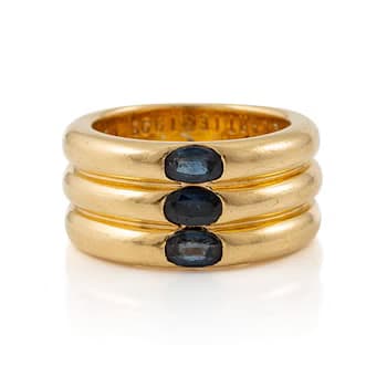 A Cartier ring "Ellipse" 18K gold with faceted sapphires.