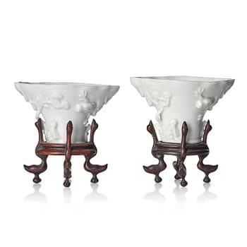 Two blanc de chine rhinoceros libation cups, Qing dynasty, Kangxi (1662-1722).