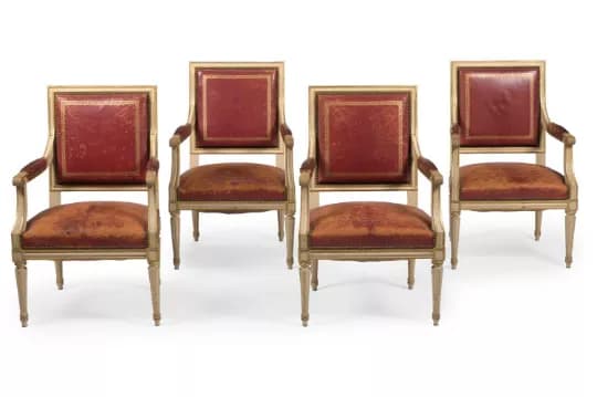 A SET OF FOUR PAINTED AND PARCEL GILT FAUTEUIL, IN LOUIS XVI STYLE