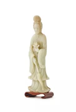 A Chinese pale celadon jade figure of female Immortal