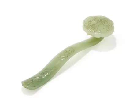 A Chinese celadon jade ruyi sceptre