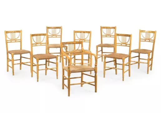 A SET OF EIGHT OCHRE PAINTED AND RUSH SEAT CHAIRS, 20TH CENTURY