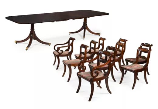 A WILLIAM TILLMAN MAHOGANY TWIN PEDESTAL DINING TABLE AND SET OF TEN