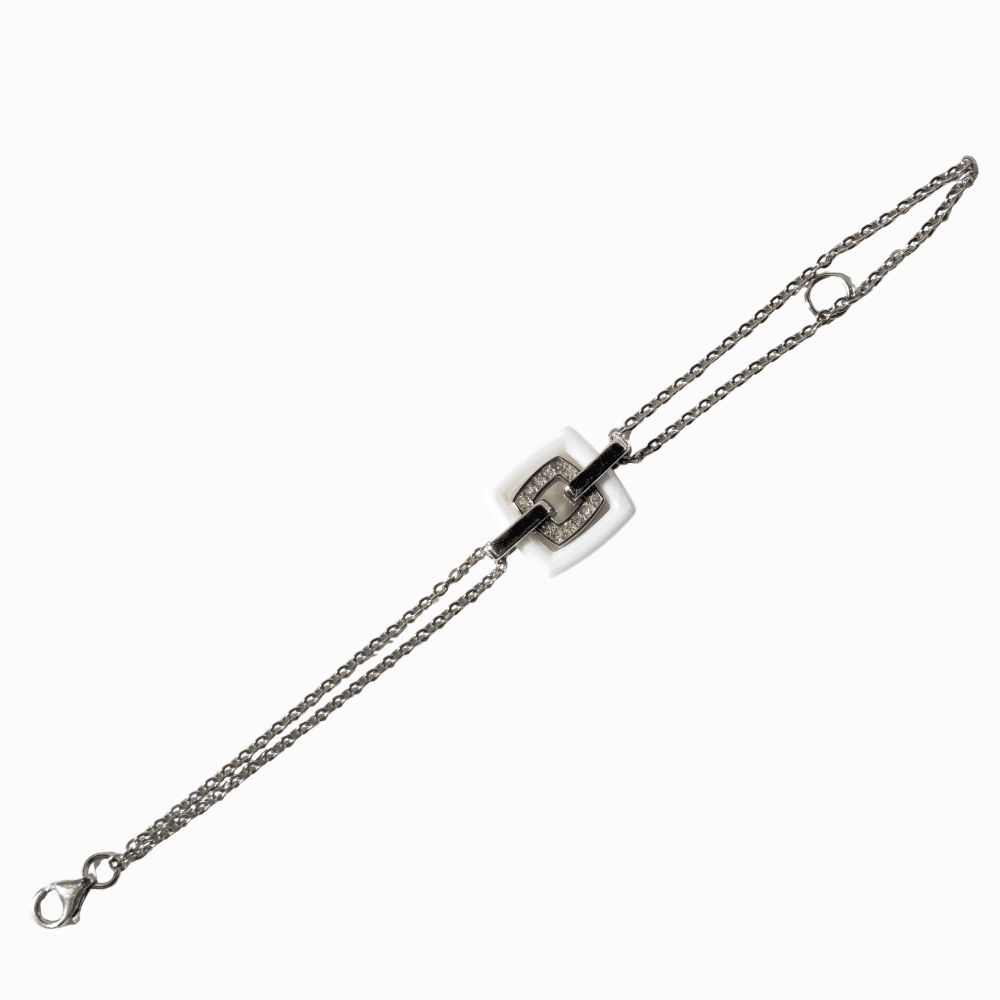 PULSERA EN PLATA Y CIRCONITAS.