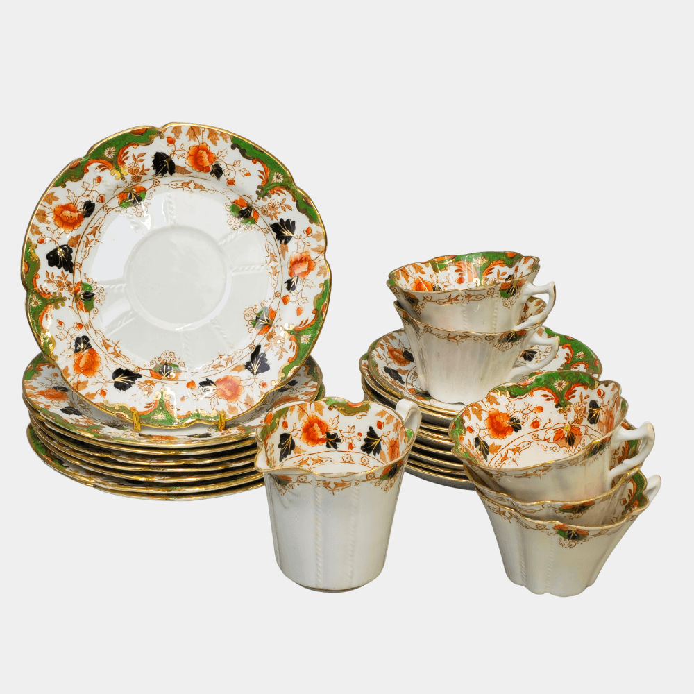 DUCHESS CHINA. JUEGO DE TÉ EN PORCELANA ESMALTADA CON MOTIVOS FLORALES.