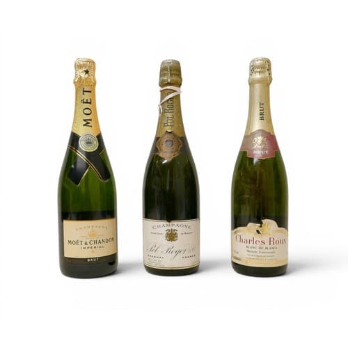 Two bottles of champagne and a bottle of white wine consisti...