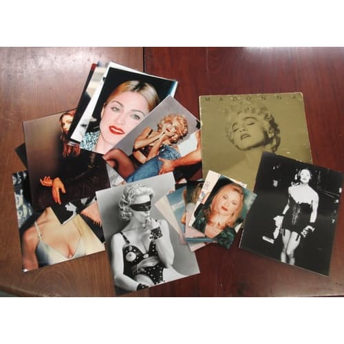 Quantity of Madonna related pictures and tour book, together...