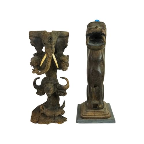 An Indian carved hardwood figure of a lion or a tiger. Late ...