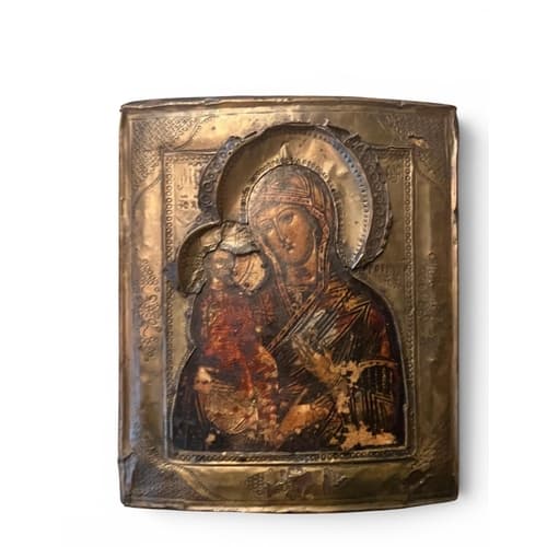 A 19TH CENTURY RUSSIAN ICON OF THE MADONNA AND CHILD WITH SI...