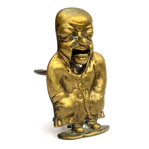 A Victorian brass figural nutcracker in the form of a bald m...