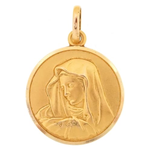 18ct gold religious interest pendant relief decorated with a...