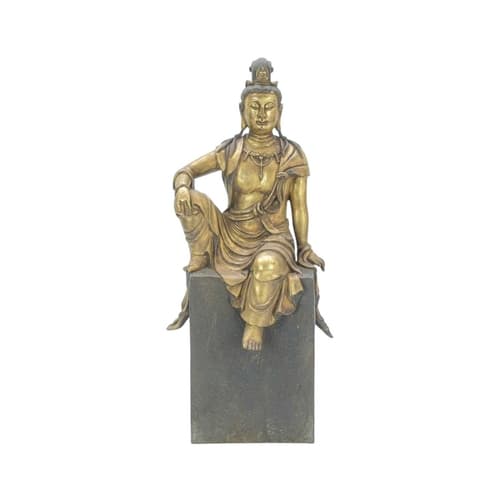 A Chinese bronze and gilded figure of Guanyin. Probably earl...