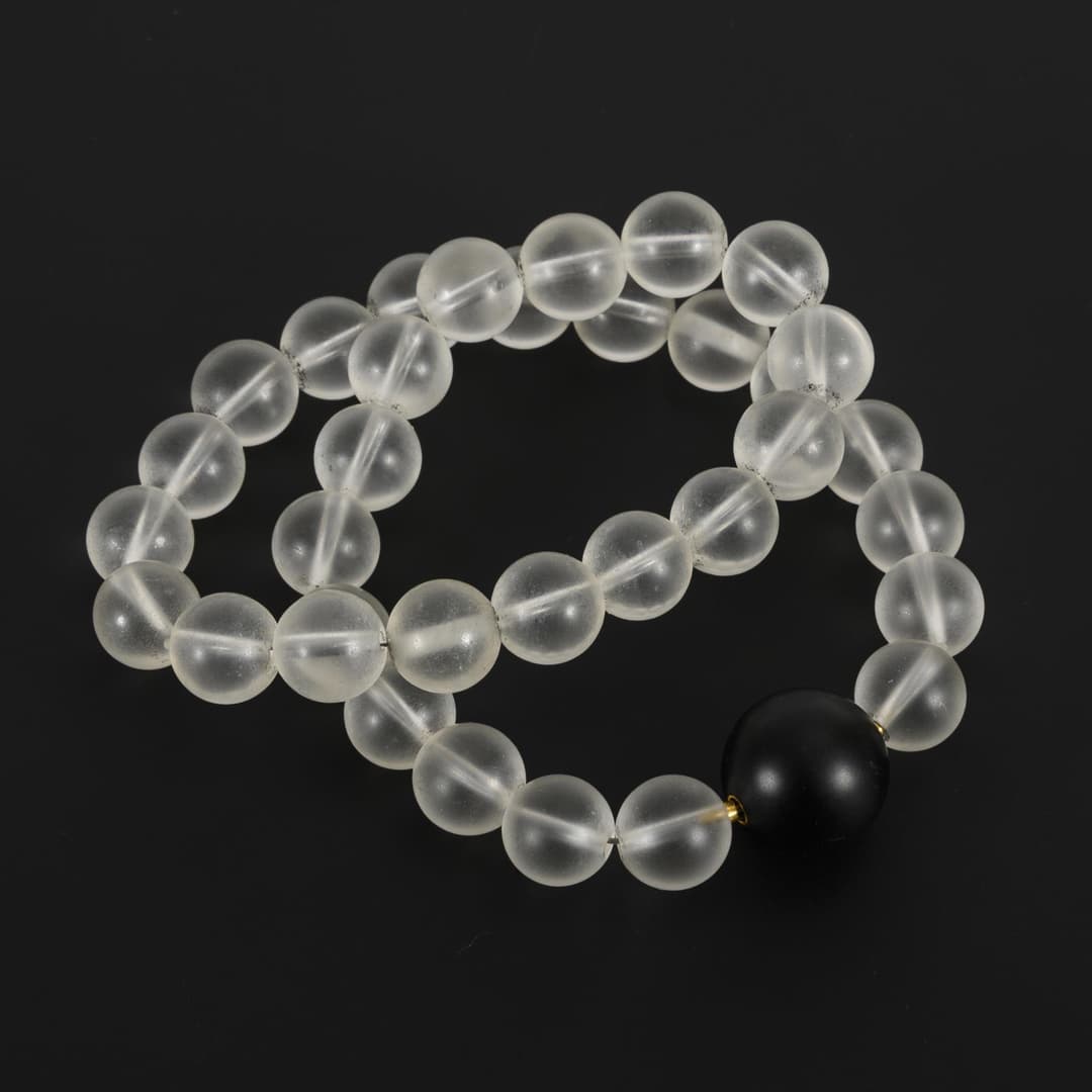 Necklace with 34 rock crystal spheres.