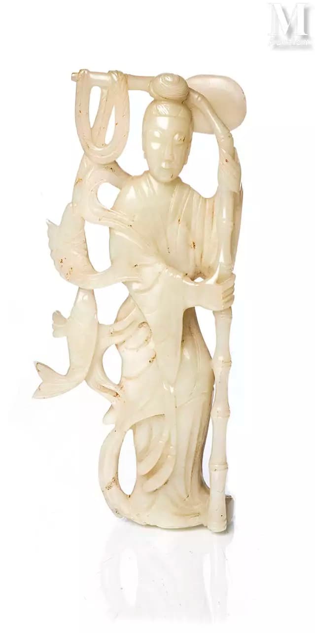 CHINE, XIXe siècle Statuette en jade blanc