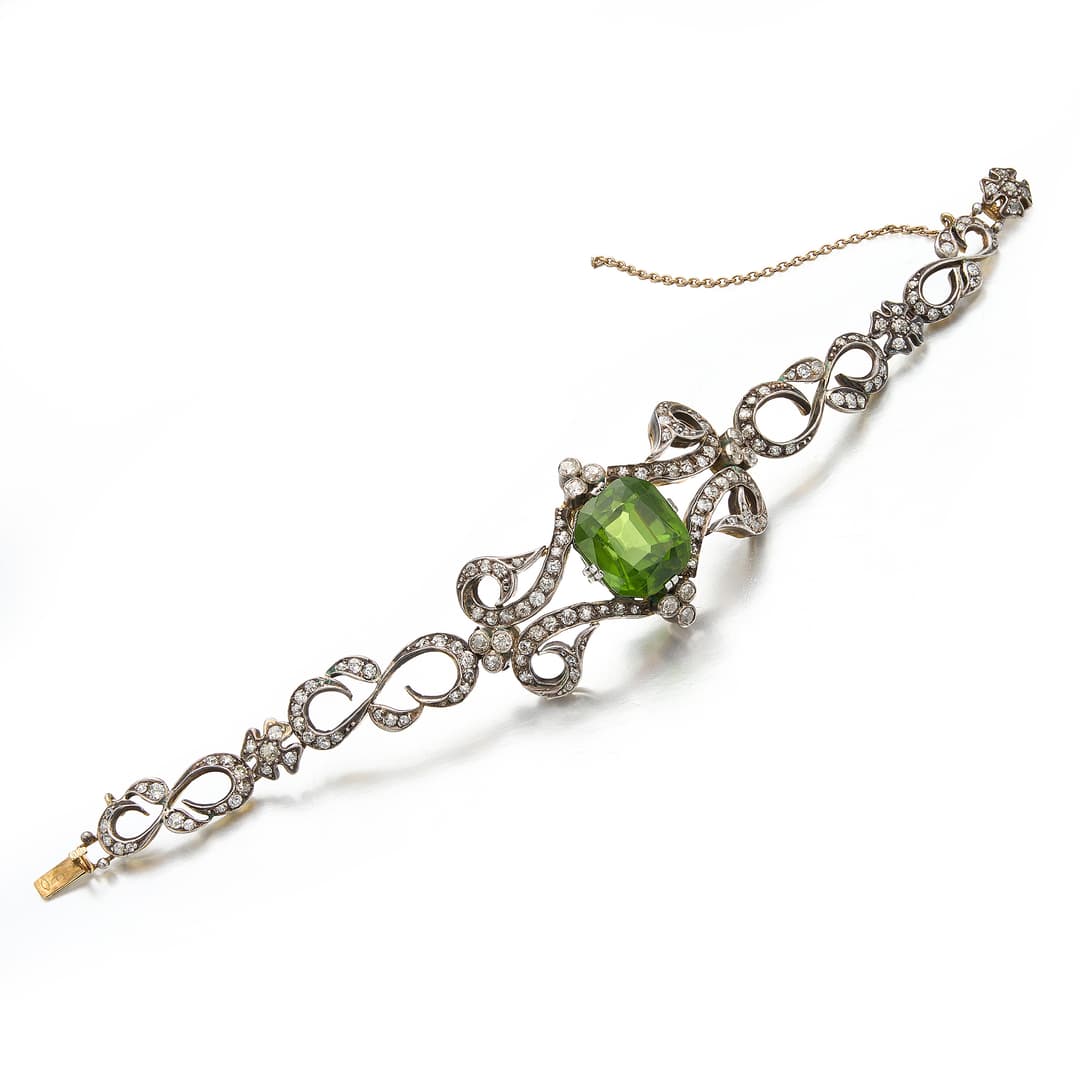 A Peridot, Diamond, Silver and Gold Bracelet, circa 1910