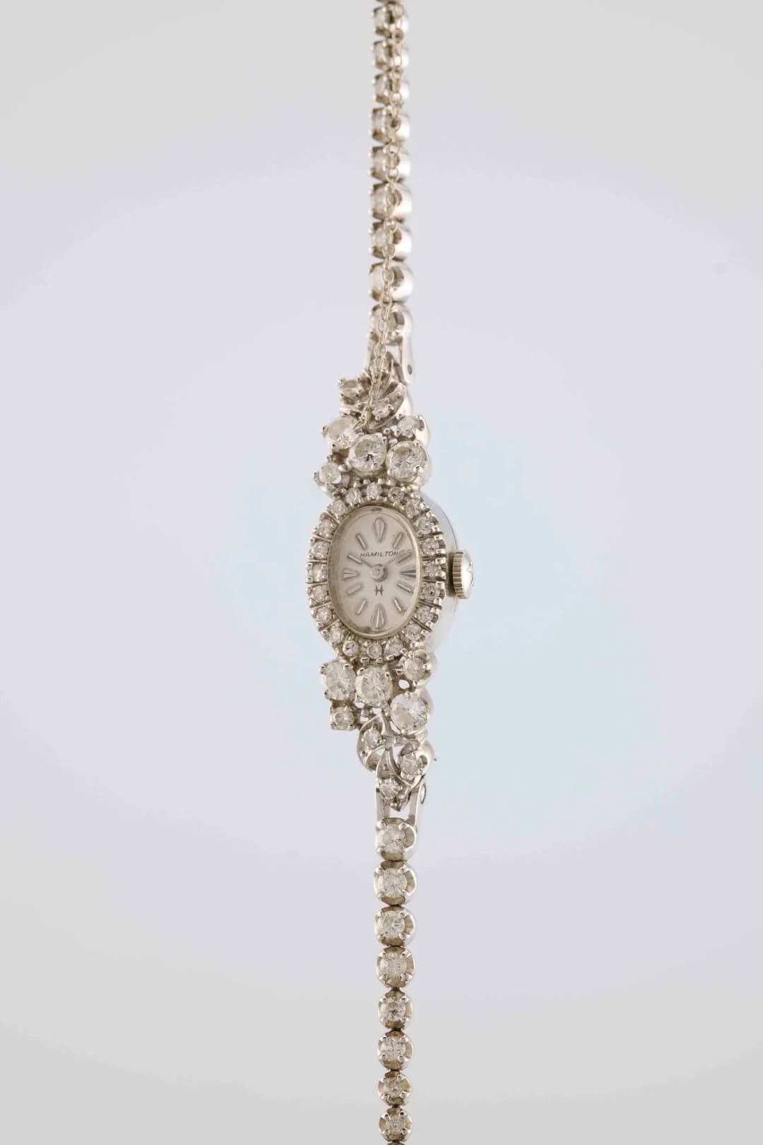HAMILTON Cocktail watch. Circa: 1980. Case: round in 585/1000 white