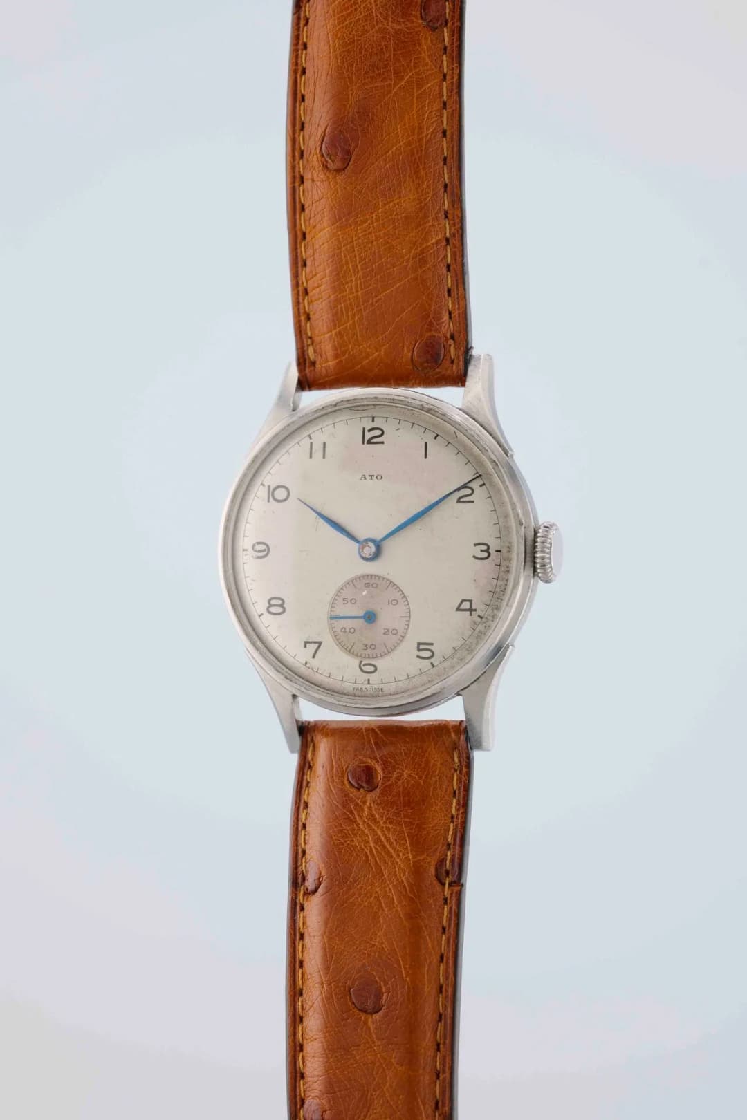 ATO Circa: 1950. Case: round steel, smooth bezel, fluted winding mechanism