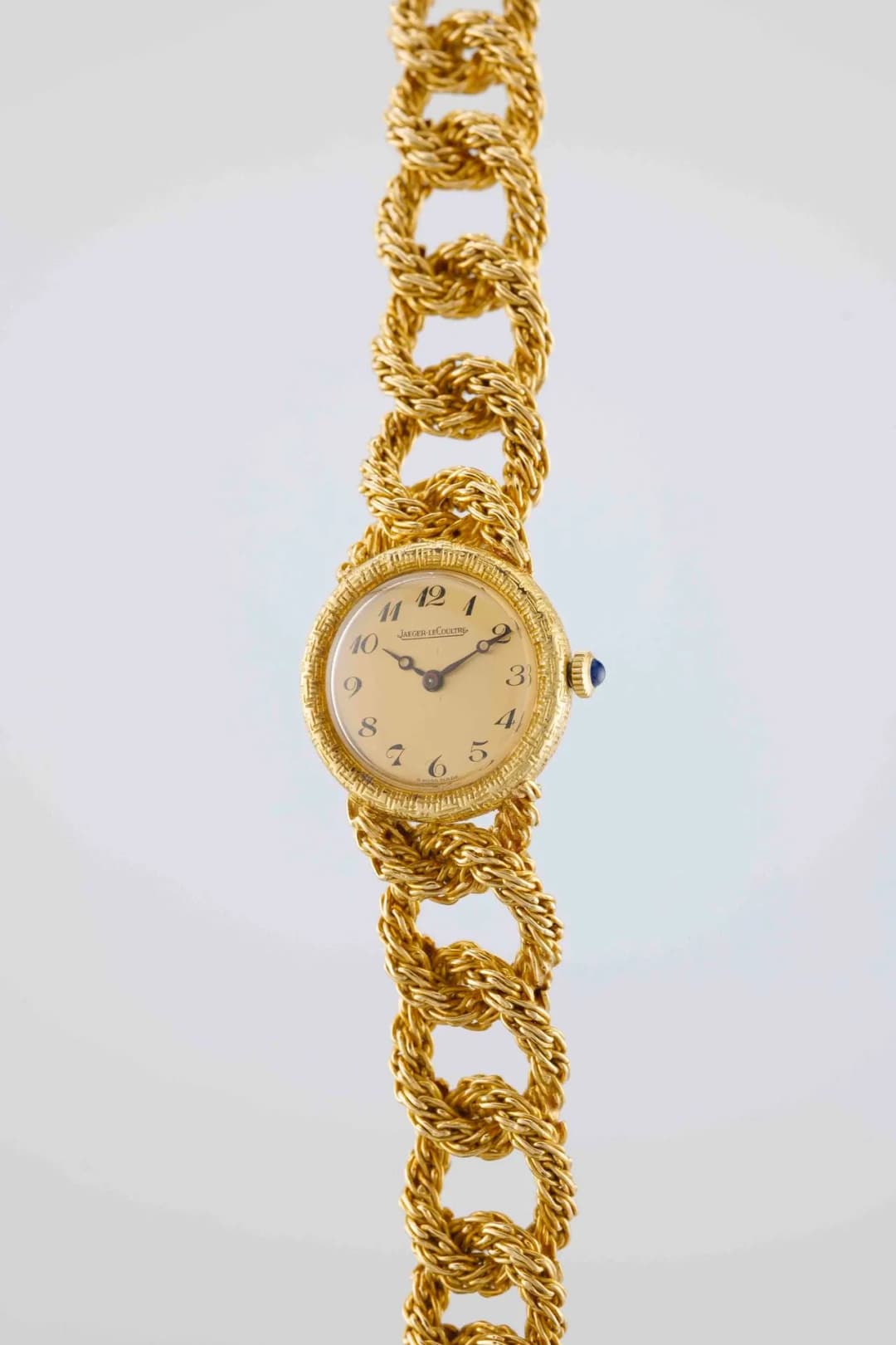 JAEGER-LECOULTRE Evening Watch. Circa: 1950. Case: round in 750/1000
