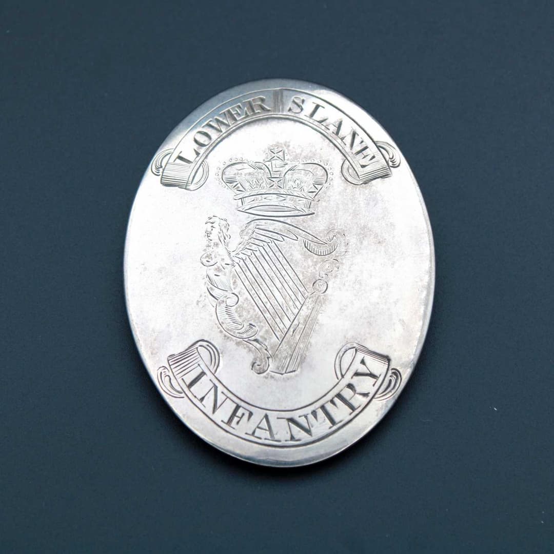 A George III silver officers shoulder belt plate