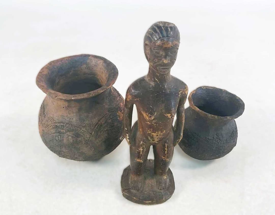 An African hardwood figure of a woman